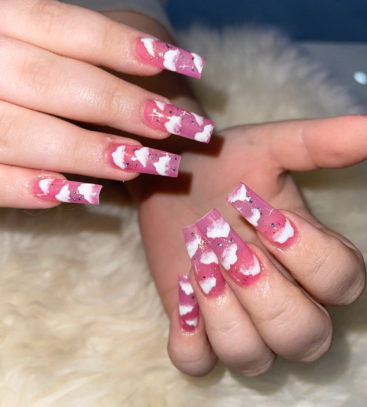Pink nails with white heart nail art